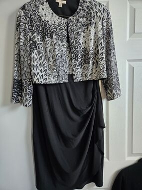 Elegant Black Dress with Patterned Jacket